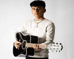 He is a self-taught guitar player who learned to play the guitar by watching videos on YouTube.